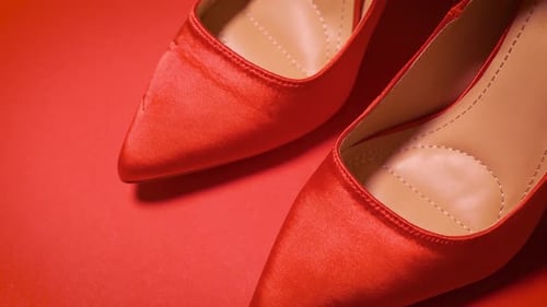 Elegant Red High Heel Shoes in Studio Setting