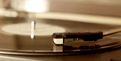 Vinyl Record Spins on Turntable Player Close Up