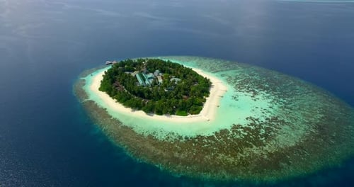 Aerial drone view of scenic tropical islands in the Maldives.