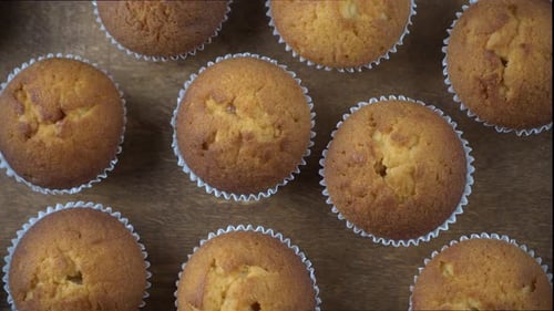 Freshly Baked Muffins on a Rustic Wood Tray