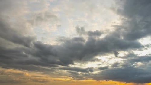 Dramatic Clouds During Colorful Sunset Time Lapse