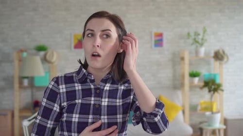 Woman Indoors Running Fingers Through Hair