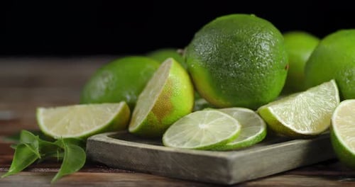 Lime on a Wooden Cutting Board Rotates Slowly