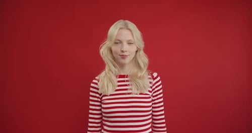 Smiling Woman Does Call Me Gesture