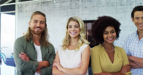 Diverse Team of Young Professionals Smiling Confidently