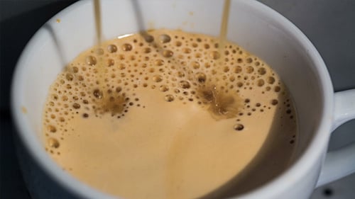 Coffee Pouring into Mug Close Up