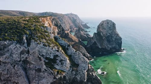 Aerial View of Rocky Cliff Coastline Near Praia Da Ursa Beach and Cabo Da Roca Located on Atlantic