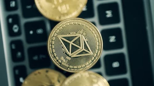 Ethereum and Bitcoin Coins on a Keyboard