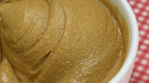 Creamy Peanut Butter in Bowl Close Up