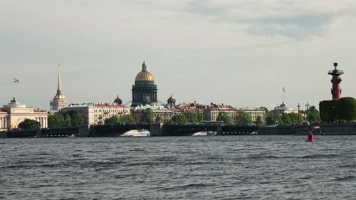 view of the beautiful old town of St. Petersburg, St. Isaac's Cathedral, water waves of the Neva Riv