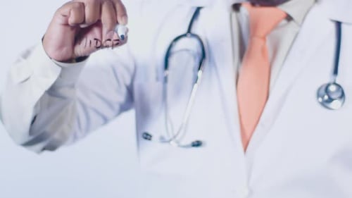 Doctor Writes On Transparent Glass Midget