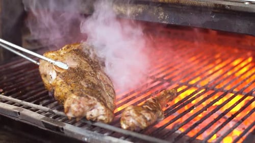 Chef Prepares Beef Steak Slow Motion Video: Flips Meat in Grill Charcoal Oven. Cooking Process
