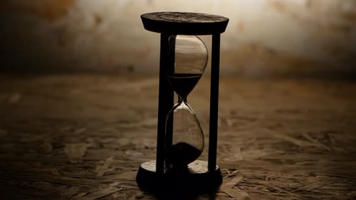 Hourglass with Black Sand. Clock in Wooden Base