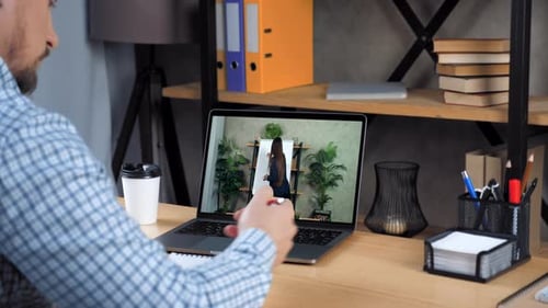 Businessman in Office Study Business Online Course Laptop Writes in Notebook