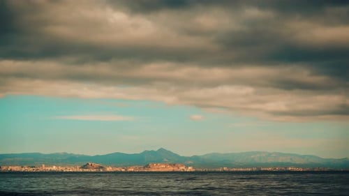 Sea Coast With Clouds Moving Over Water, Timelapse