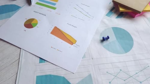 Financial Graph Calculator and Notepad on Table