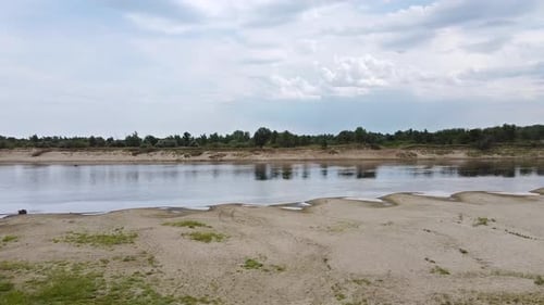 A beautiful river with a sandy coast