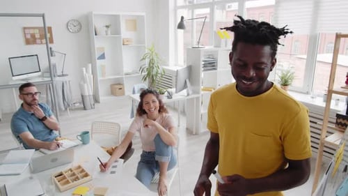 Team Collaborating on Project in Bright Modern Office