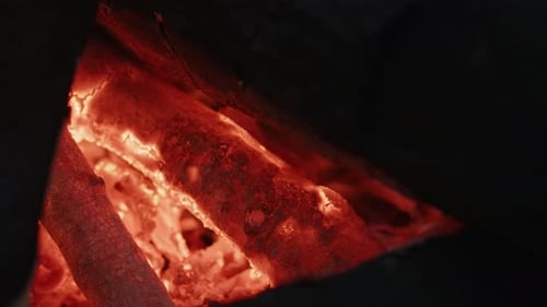 Glowing Red Embers of a Wood Fire