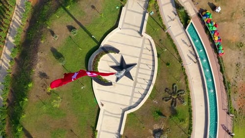 Aerial View of Urban Park with Star Monument