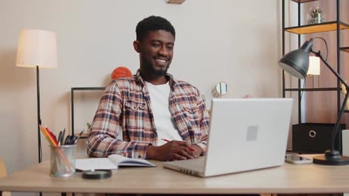 African American Making Conference Calling By Webcam Focused Student Study Online at Home Office