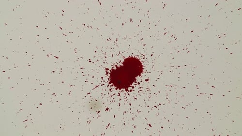 Dramatic Red Blood Splatter on White Background