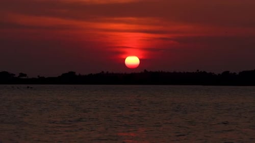 Zoom out of Sun with beautiful Red sky and sunset