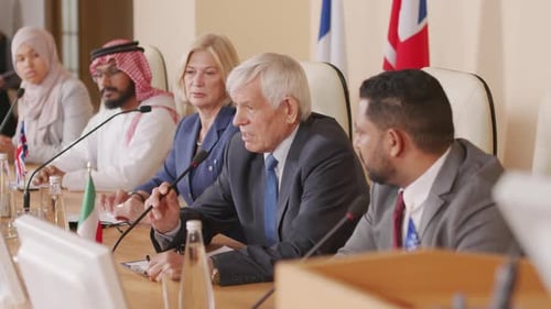 Diverse People Talking at a Conference Table