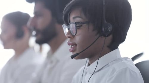 Call Center Operator. Beautiful Black Woman In Headset Working