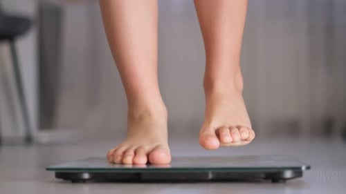 Child Measuring Weight
