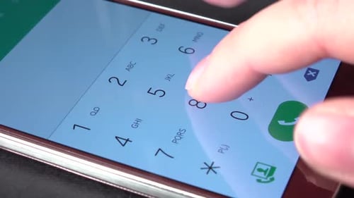 Finger Typing Numbers on Smartphone Screen Close Up