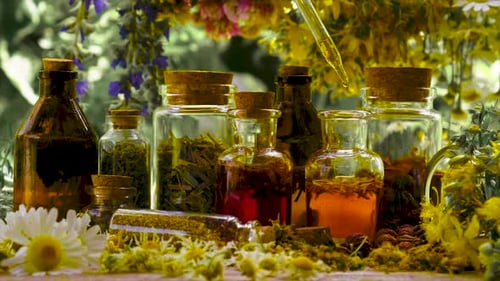 Herbal Tinctures with a Dropper over Glass Bottles