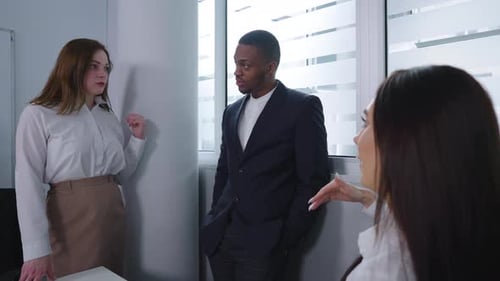 Business People Having Discussion in Office