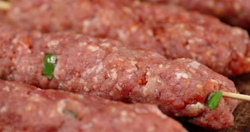 Raw Sausages From Homemade Mince Slowly Rotate.