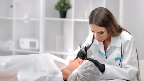 Woman Performs Permanent Makeup in Cosmetic Clinic