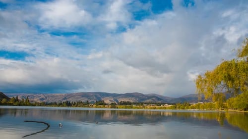 Rainbow above river timelapse