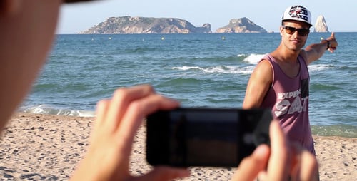 Man Posing for Pictures on Beautiful Beach