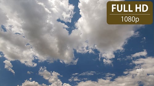 Clouds Move Across Blue Sky During the Daytime