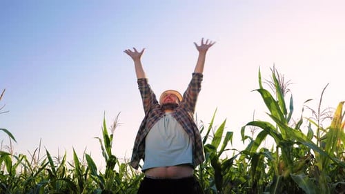 Young Man Farmer Agronomy Joyfully Jump Laugh Shout Something Raise Hands Up Looking Up Bottom View