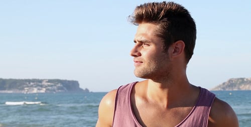 Man Walking On The Beach