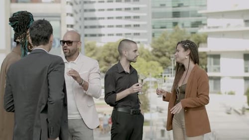 Professionals Toasting Champagne at Outdoor Gathering