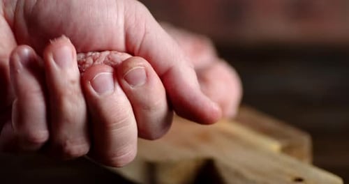 Hands Forming Meatball Close Up