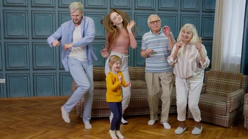 Family Dancing Together in Living Room