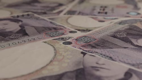 Close Up of Scattered Japanese Yen Banknotes