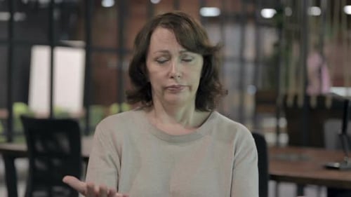 Angry Old Woman Having Arguments and Pointing Finger
