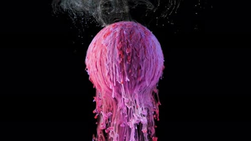 Multicolored Ink Paint Slowly Flows From the Ball