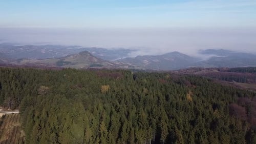 Great mountain range, blue sky and fogy valley