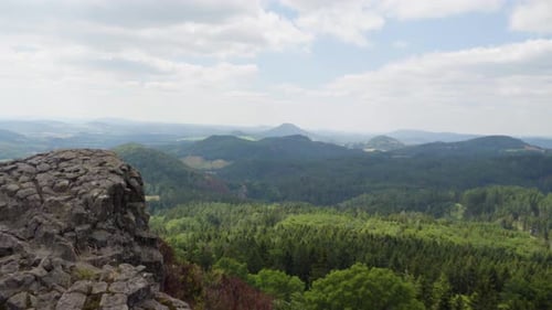 A View of Nature, Mountains and Hills From a Rocky Mountain. Sunny Day with a Few Clouds in the Sky.