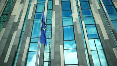 European Flag in Front of Modern Building