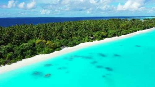 Daytime overhead copy space shot of a paradise sunny white sand beach and blue water background in h